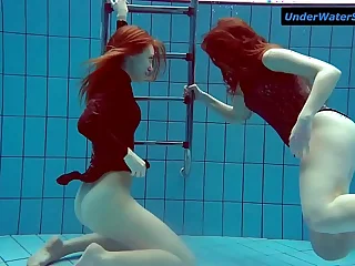 Two hot teens submerged