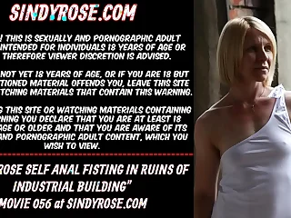 Sindy Rose self anal fisting in the demolishing of industral building